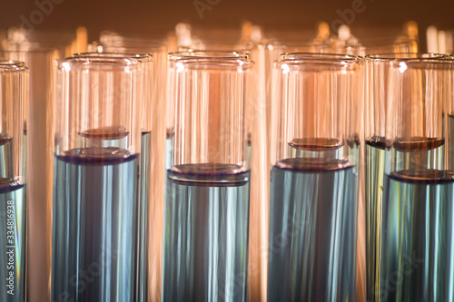 Laboratory test tube with sample chemical in rack for science experiment in lab research