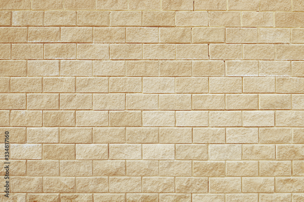 Obraz premium Old beige stone wall background texture