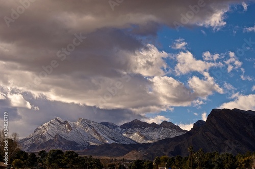 Fototapeta Naklejka Na Ścianę i Meble -  snowy Mountains & Cloudy Sky