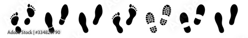 Flat linear design. Different human footprints. Black silhouettes isolated on white background. Vector illustration