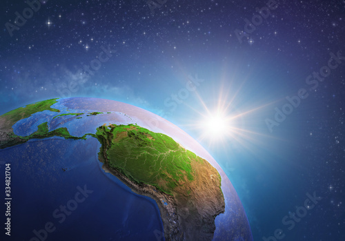 Sun shining over Amazonia from space
