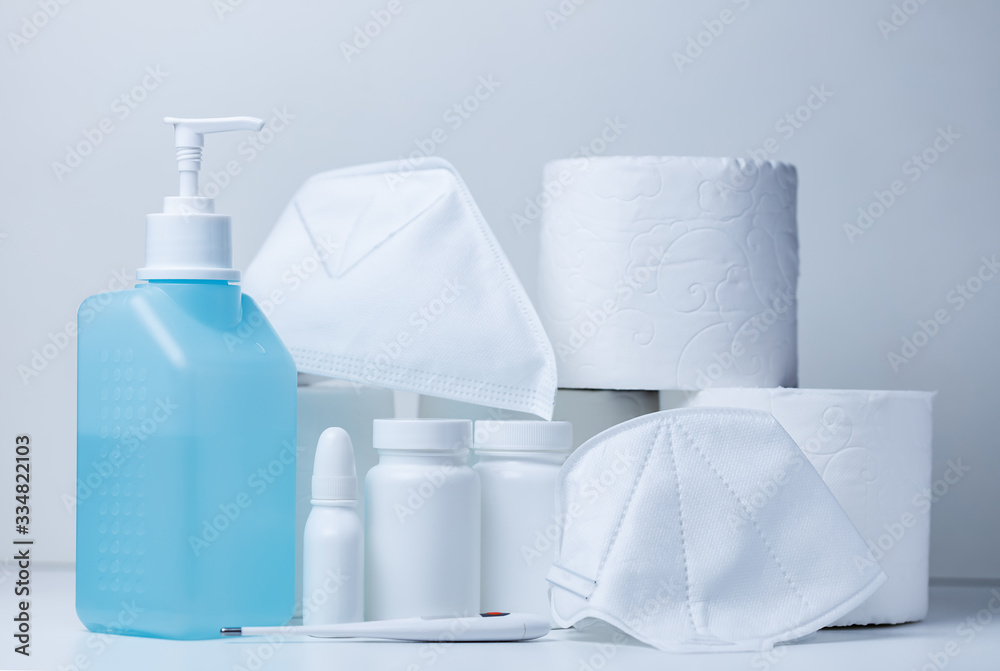 Hand sanitizer and face masks on store shelf hospital supplies for corona virus Hand sanitizer and face masks on store shelf hospital supplies for corona virus