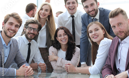 professional team of young business people sitting at the table. photo