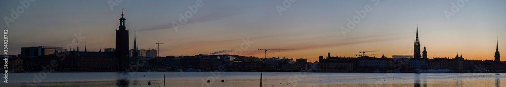 View at sunrise over the districts Kungsholmen and the old town Gamla Stan and the bay Riddarfjärden