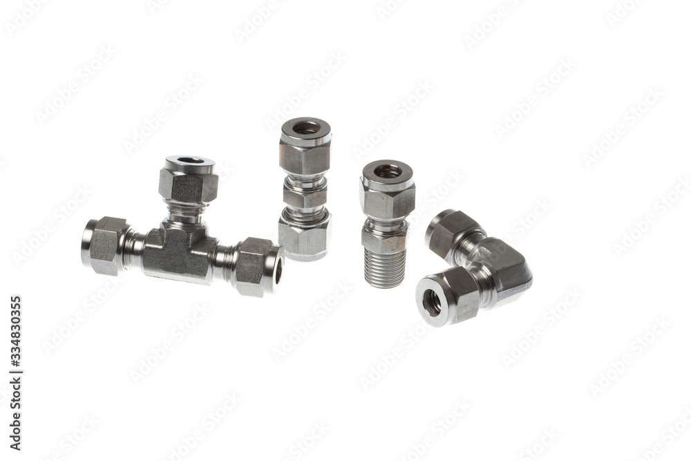 Set of different steel couplings for metal pipe, isolated on white background Set of different steel couplings for metal pipe, isolated on white background
