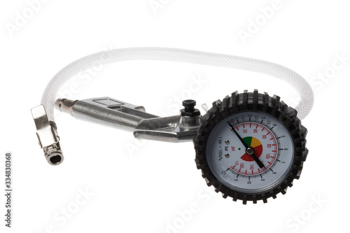 Aluminum compressed air pistol with manometer and a clear hose for tire pumping, siolated on white background