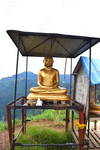 Buddha statue on the small peak of Adam, Sri Lanka photo