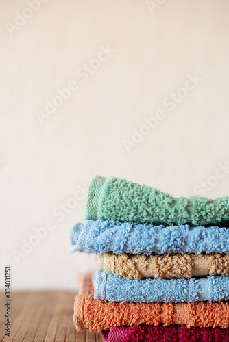 Colorful towels on background