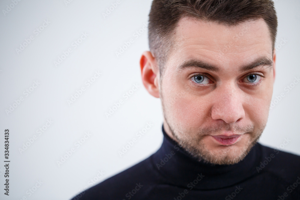 Portrait of a male businessman on a white background. Portrait of a male businessman on a white background.