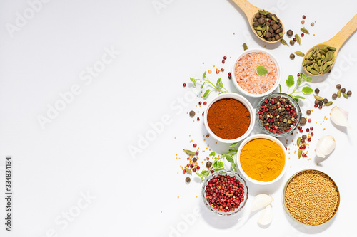 Set of aromatic organic spices and herbs on white background with copy space for your design.