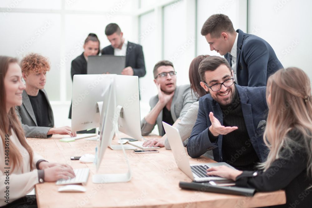 business colleagues discussing work issues in the workplace. business colleagues discussing work issues in the workplace.
