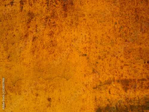 Bright orange highly rusty old metal surface.