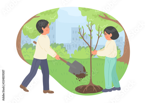 Children plants tree in the city park. Springtime. Kids with shovel working and dig ground outdoors. 