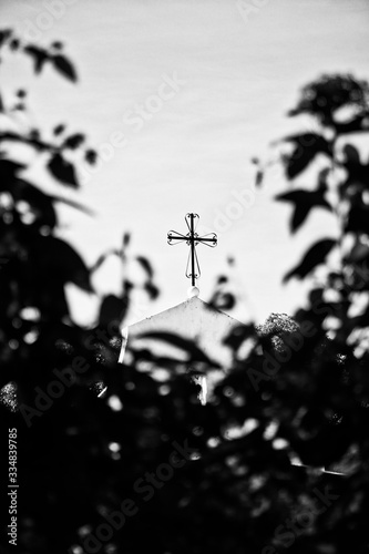 cross on a church in black and white © Addison Spates