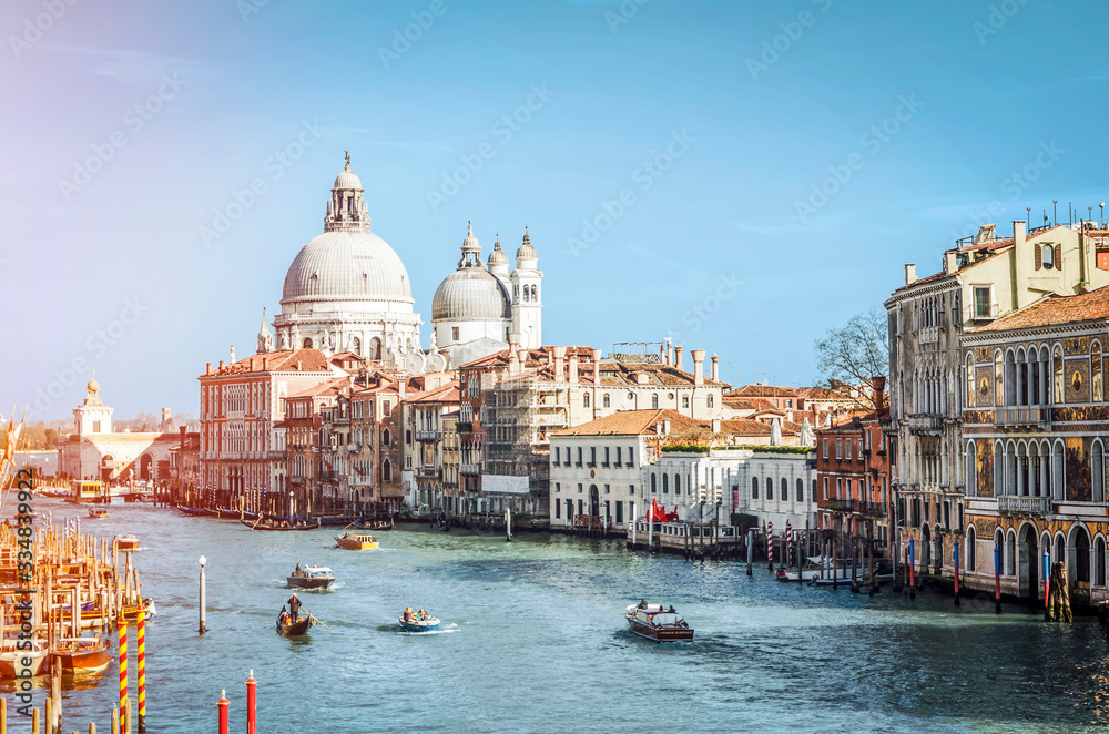 Canal with boats in Venice, Italy
