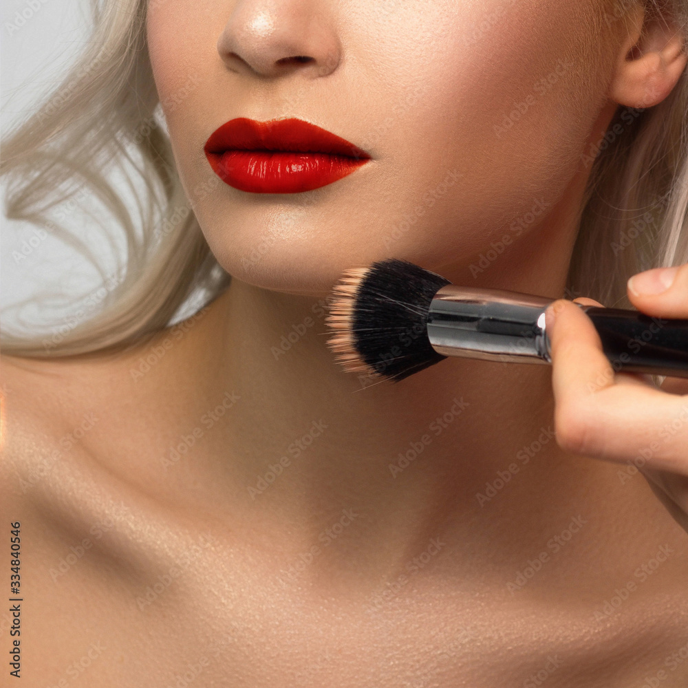 Sexual full lips. Natural gloss of lips and woman's skin. The mouth is closed. Increase in lips, cosmetology. red lipstick. Open mouth and with teeth. blonde hair. face powder on clean skin Sexual full lips. Natural gloss of lips and woman's skin. The mouth is closed. Increase in lips, cosmetology. red lipstick. Open mouth and with teeth. blonde hair. face powder on clean skin