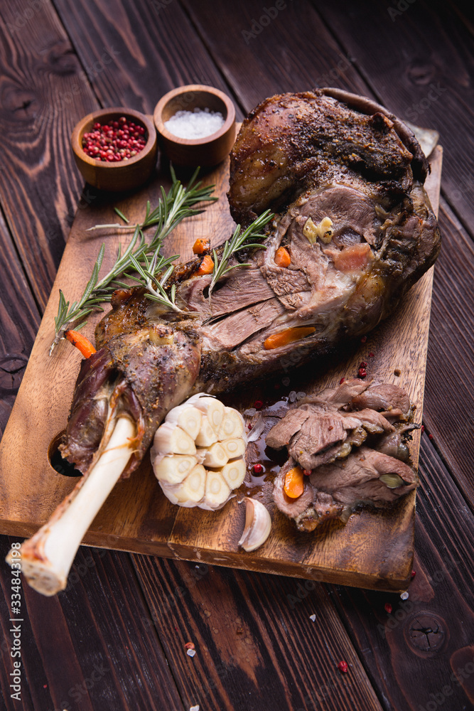 Fototapeta premium roast meat leg of lamb garlic spices