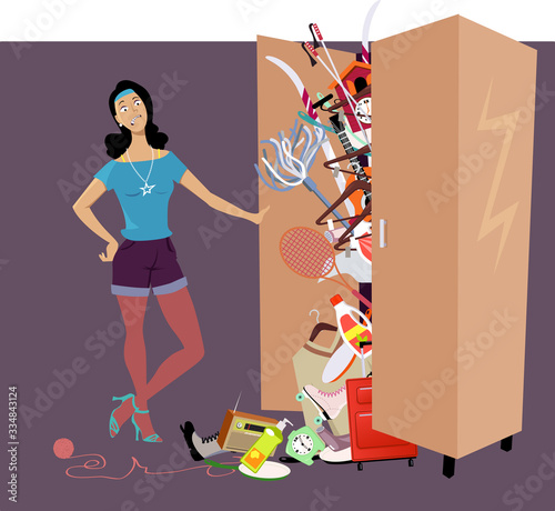 Woman looking at her possessions falling out of a overfilled closet, EPS 8 vector illustration