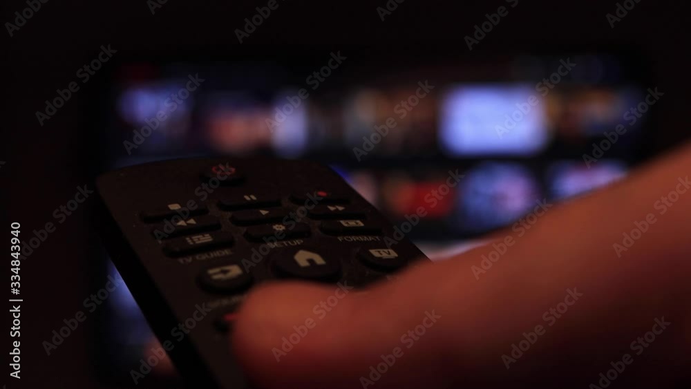 Hand Of Man Operating tv Remote At Home Hand Of Man Operating tv Remote At Home