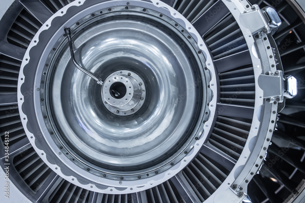 Turbine Engine. Aviation Technologies. Aircraft jet engine detail during maintenance. Blue toned.