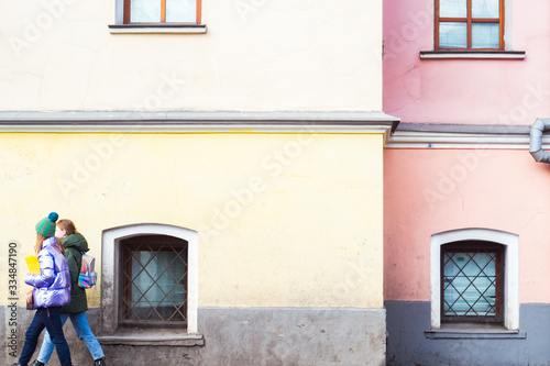  two teenagers walk the streets of Moscow photo