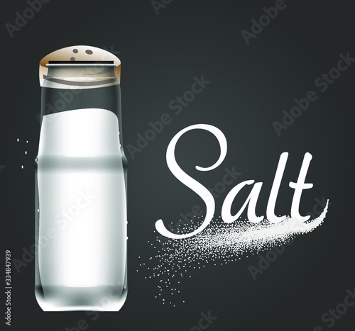 Isolated salt shaker with a dark background