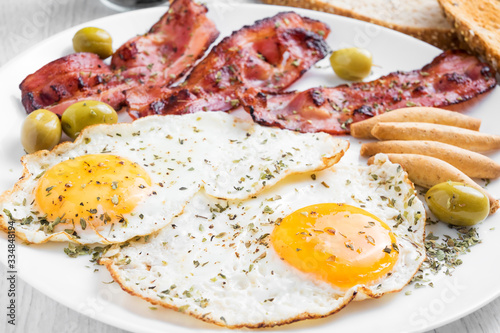 Breakfast with roasted bacon and roasted eggs