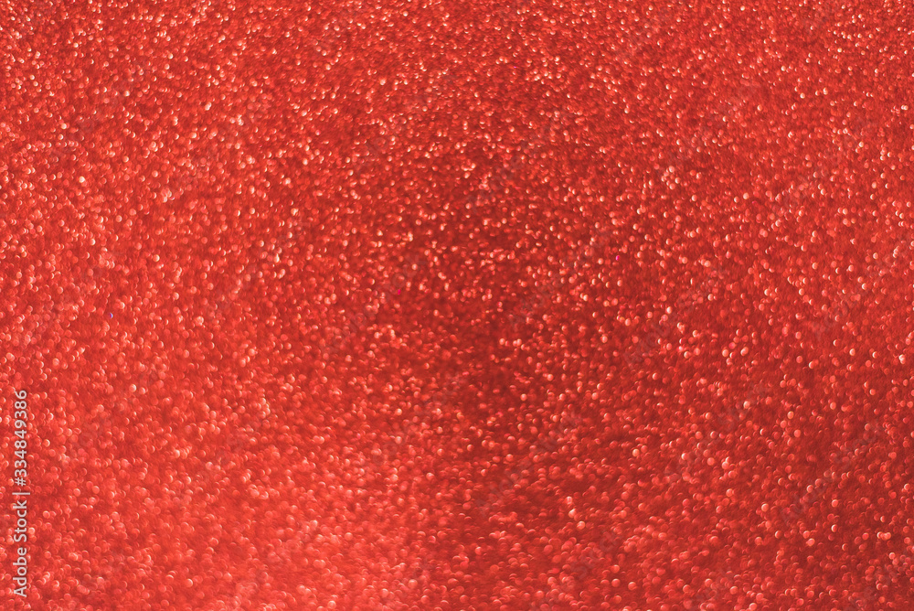 Red shiny background with sparkles. Abstract holiday background
