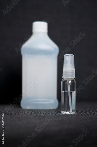 Atomizer and alcohol bottle photo
