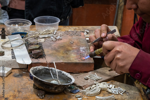 Indigenous jeweler working