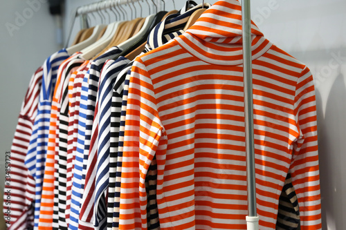 striped sailor shirts on a hanger