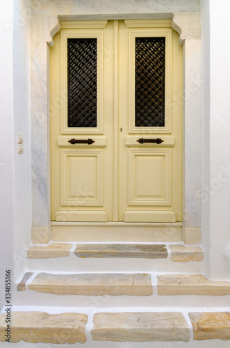 Colored door of a traditional Greek house in Parikia, the capital of Paros island in Greece