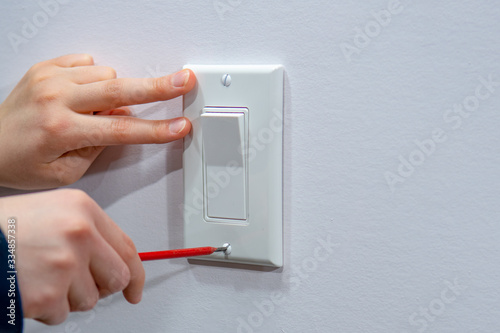 Fastening the finishing decorative platband for the electrical switch