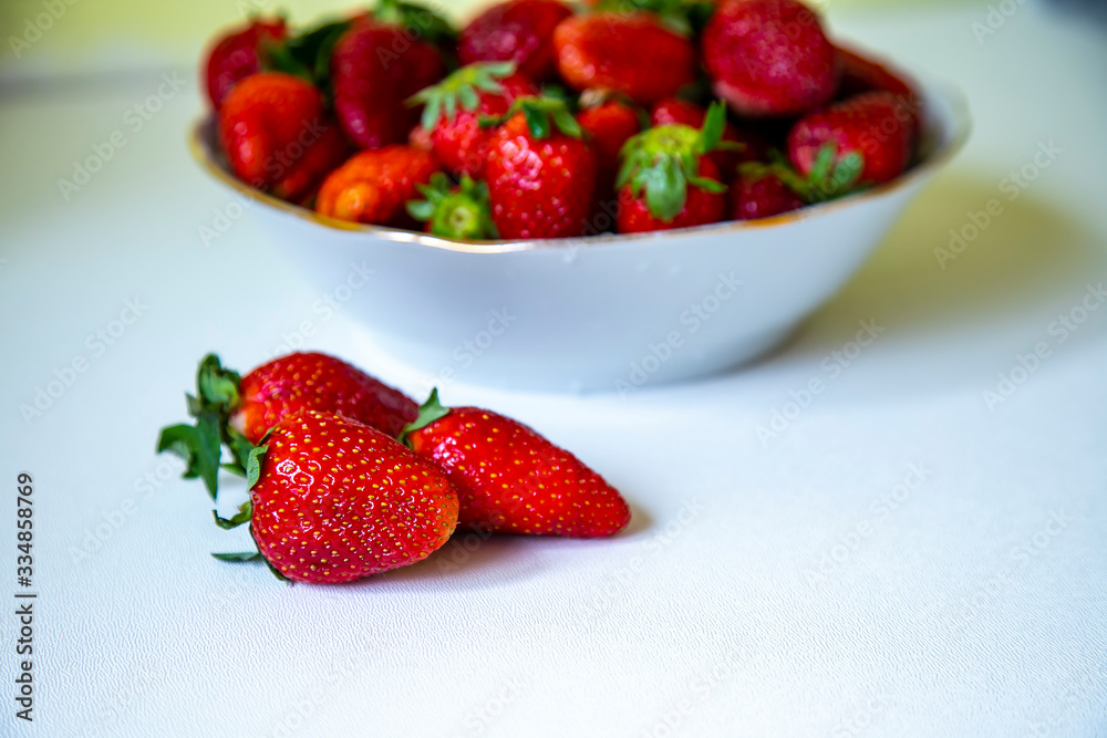 Ripe, juicy strawberries on the table Ripe, juicy strawberries on the table