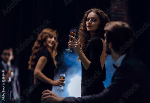 two glamorous woman in a casino