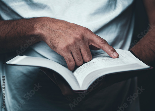 Young man reading the word of God