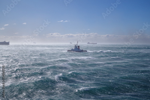 Tug during bad weather at sea / storm