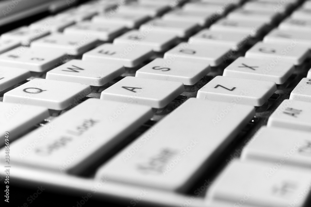 close up white computer keyboard button close up white computer keyboard button