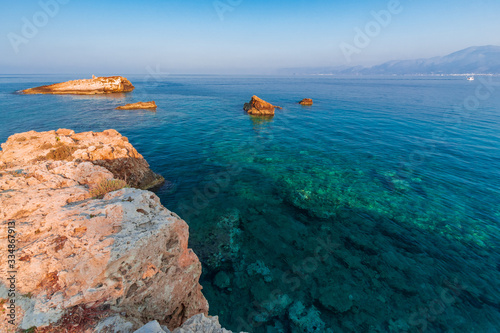 Crete island beach and mountains in the evening time. Greece vacation. photo