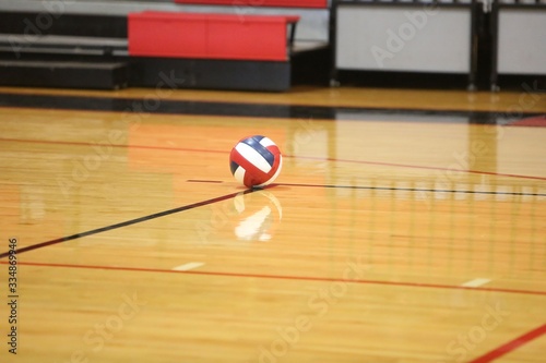 Volleyball on court floor