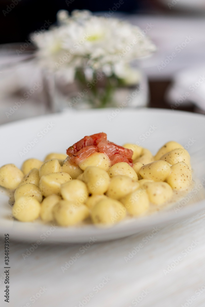 small gnocchi with raw shrimp and pepper small gnocchi with raw shrimp and pepper
