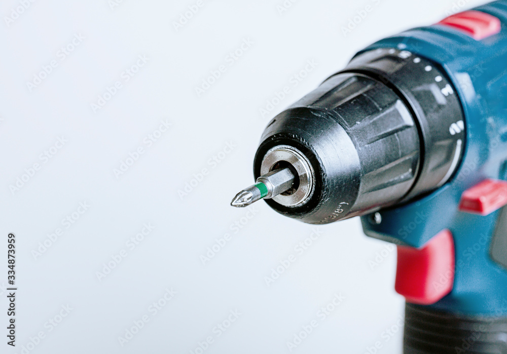isolated screwdriver drill machine closeup isolated screwdriver drill machine closeup
