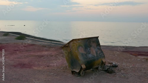 Wallpaper Mural An old useless trash can garbage bin on top of a viewpoint near sea Torontodigital.ca