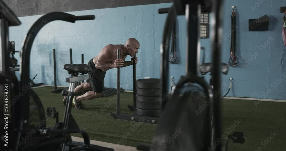Man performing workout in gym