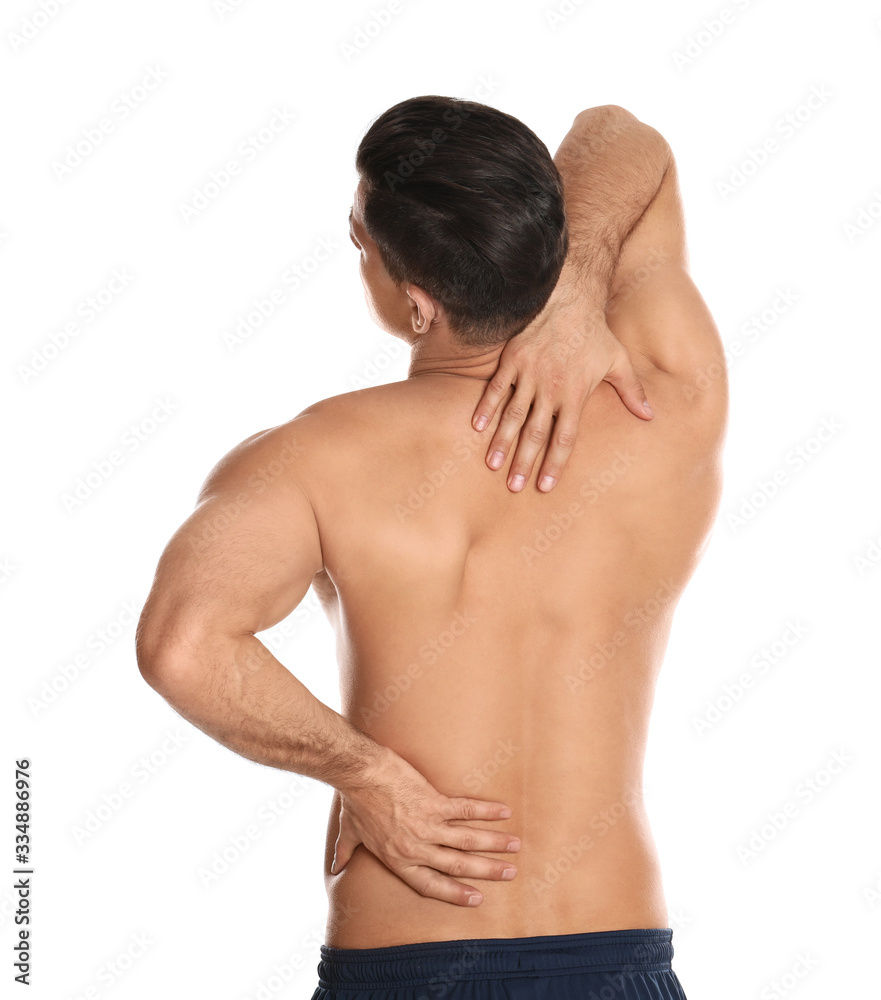 Man suffering from pain in back on white background. Visiting orthopedist Man suffering from pain in back on white background. Visiting orthopedist