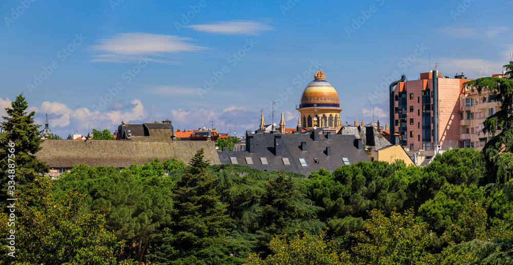 Cityscape with the colorful dome of the Church of or Iglesia Santa Teresa y San Jose in the city center, Madrid, Spain
