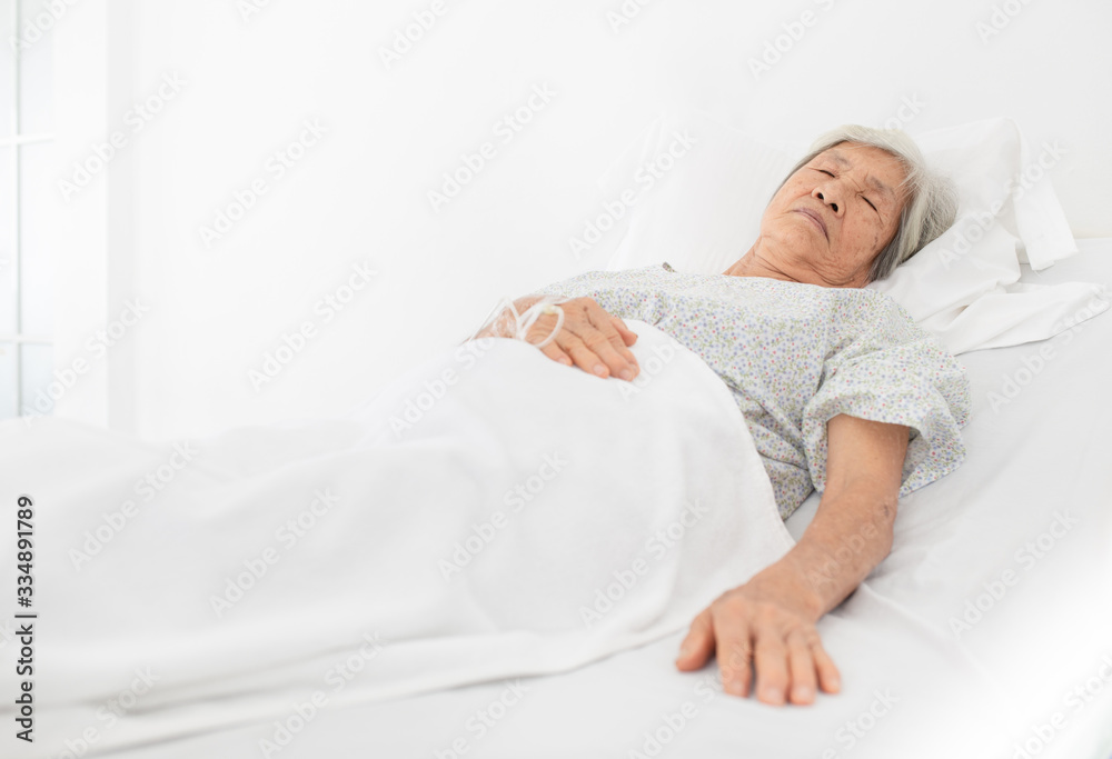 palliative care, old Asian patient sleep on white bed, she feeling lonely, necklace old female, mother's day palliative care, old Asian patient sleep on white bed, she feeling lonely, necklace old female, mother's day