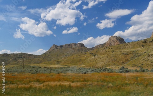 Spectacular mountainside landscape in Wyoming, with buttes and rock formations.