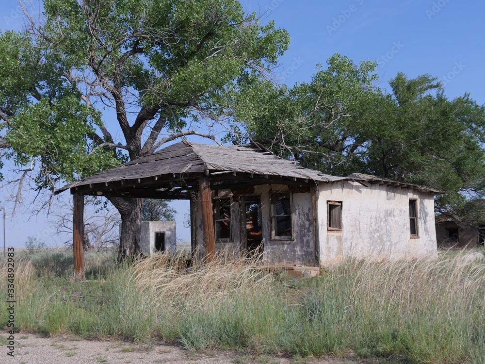 Side front view of a dilapidated structure at Glenrio ghost town, one of western America's ghost towns. Side front view of a dilapidated structure at Glenrio ghost town, one of western America's ghost towns.