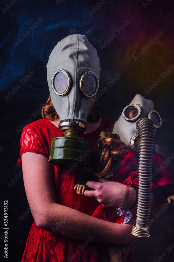 social distancing young girl hugging doll wearing gas mask in smoke filled  virus room Stock Photo | Adobe Stock